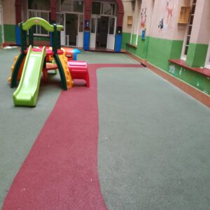 suelo caucho parque infantil
